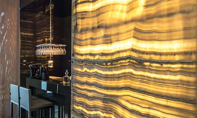 a wall with striations, backlit