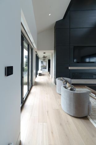 Qolsys keypad in a modern house