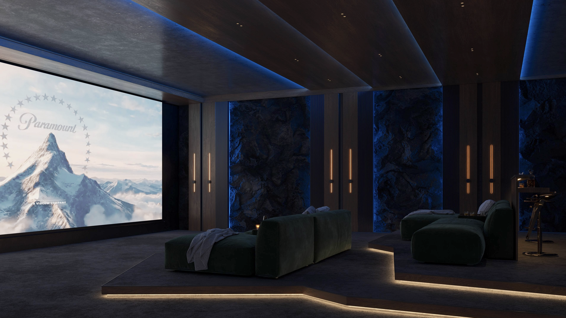 Dimly lit home theater with blue accent lighting, modern seating, and a large projection screen.