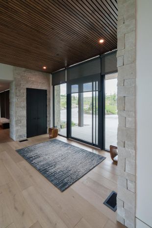 Modern House entrance with Lutron Sheer Shades halfway open