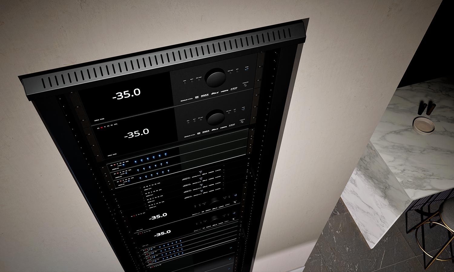 A rack-mounted audio system displaying several black components with digital volume indicators set to -35.0, highlighting a sleek and modern home audio setup.