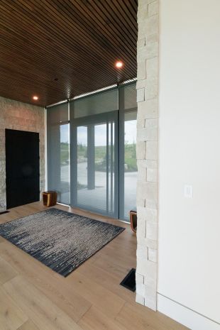 Modern House entrance with Lutron Sheer Shades completely closed