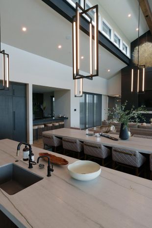 Modern Kitchen with industrial lighting fixtures