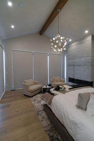 Lutron Blackout Shades closed in a modern bedroom